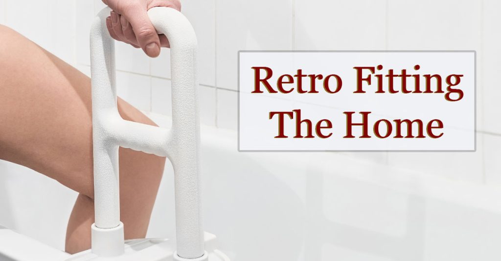 Retro fitting the home with assistive modification. Lady using a step device to enter the bath tub.